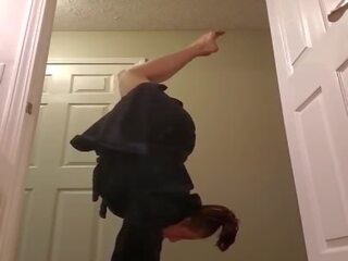 Fit babe doing handstands and showing off her big tits